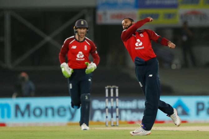 Adil Rashid celebrates after dismissing India skipper Virat Kohli.