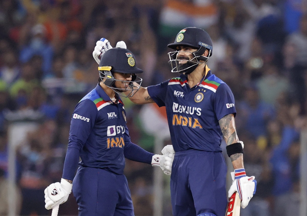 India skipper Virat Kohli congratulates Ishan Kishan after the debutant gets to 50.