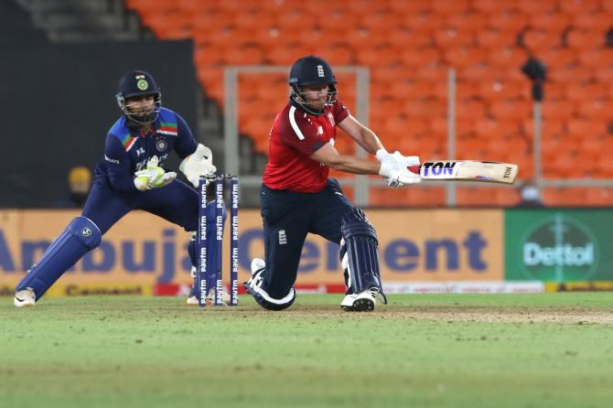 Jonny Bairstow sends the ball to the boundary