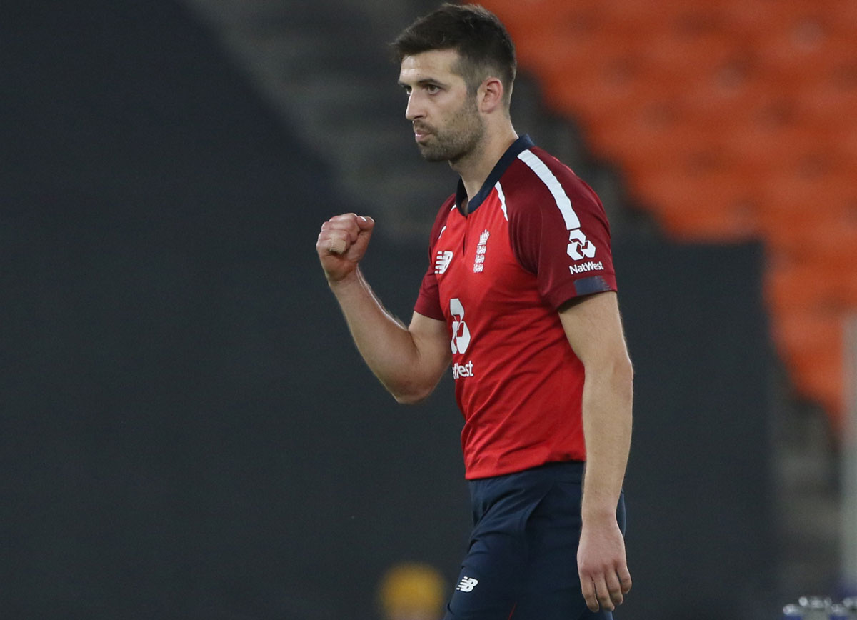 Mark Wood celebrates the wicket of Shreyas Iyer