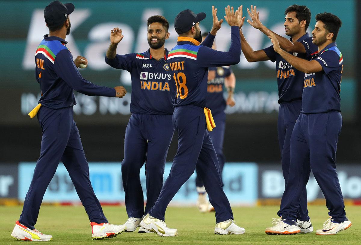 Bhuvneshwar Kumar celebrates the wicket of Jos Buttler