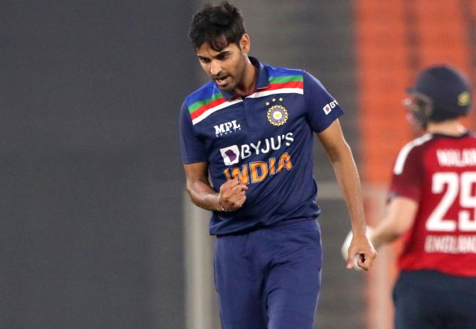 Bhuvneshwar Kumar celebrates the wicket of Jos Buttler