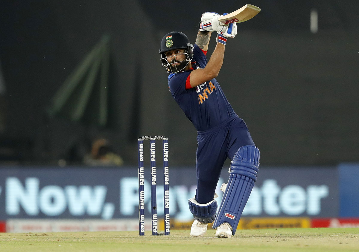 Virat Kohli lofts the ball over the ropes