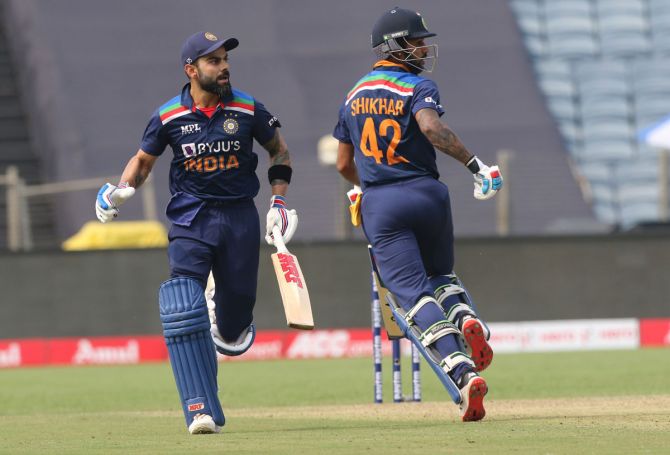 Virat Kohli and Shikhar Dhawan run between the wickets