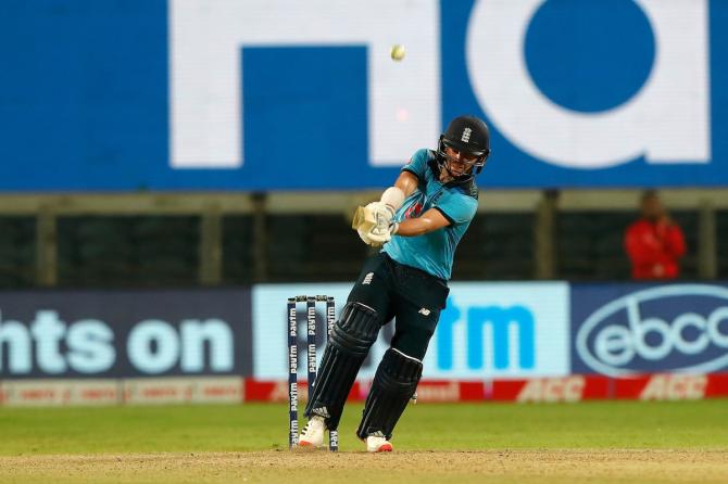 Sam Curran sends the ball over the boundary during his blazing, unbeaten 95