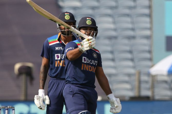 Rishabh Pant celebrates after completing his fifty in the third ODI against England in Pune on Sunday 