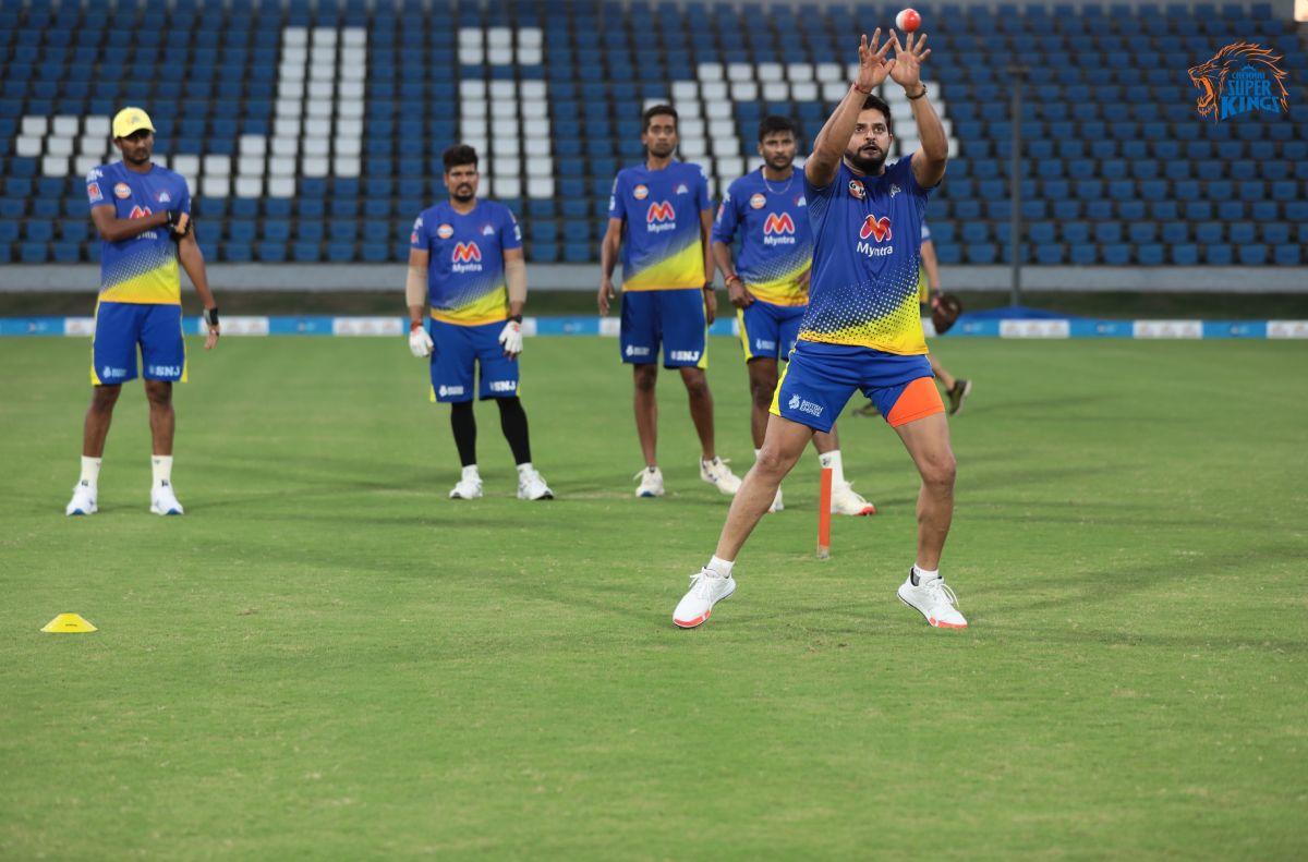 Suresh Raina does catching practice at a training session on Wednesday