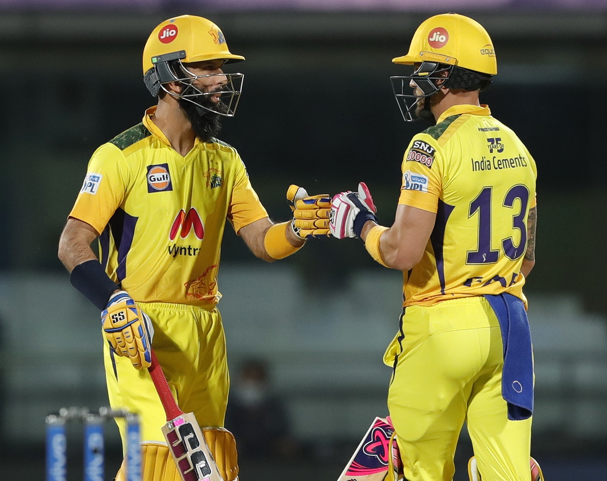 Moeen Ali and Faf du Plessis celebrate a six during their second wicket partnership