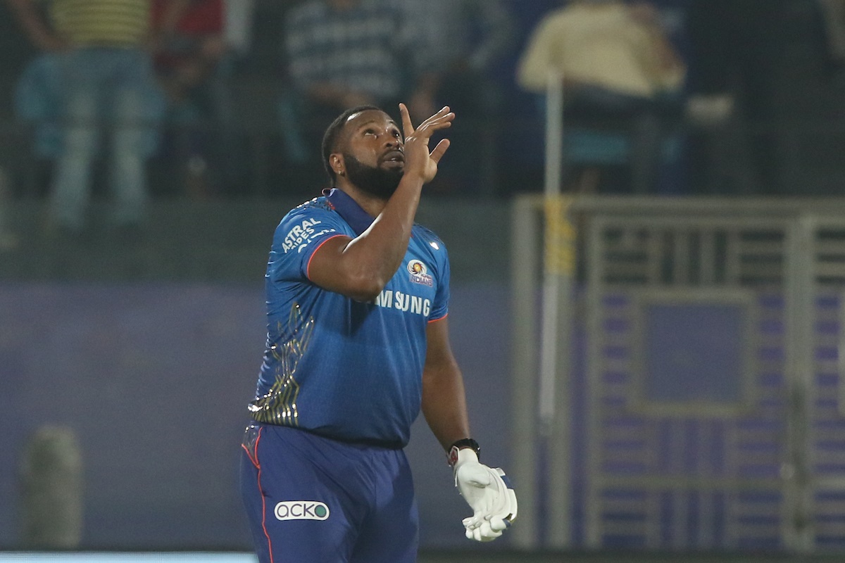 Kieron Pollard celebrates after scoring the winning runs for Mumbai Indians in the IPL match against Chennai Super Kings, in Delhi, on Saturday.