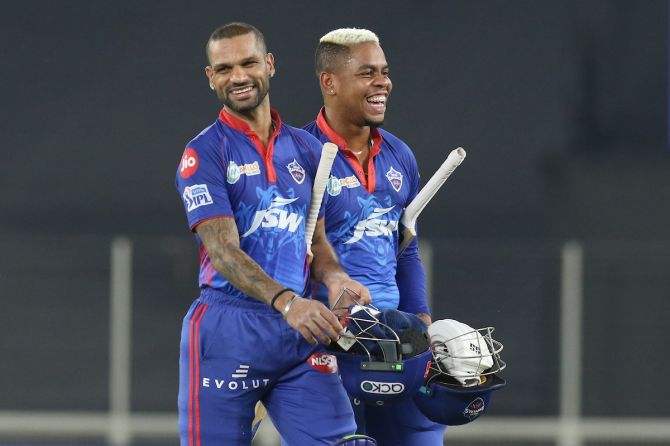 Delhi Capitals batsmen Shikhar Dhawan and Shimron Hetmyer walk back after clinching victory over Punjab Kings in the IPL match, in Ahmedabad, on Sunday.