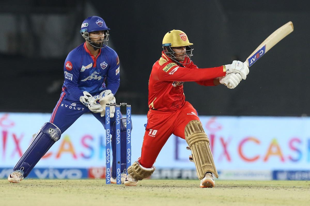 Mayank Agarwal sends the ball to the boundary during the IPL match against Delhi Capitals in Ahmedabad, on Sunday.