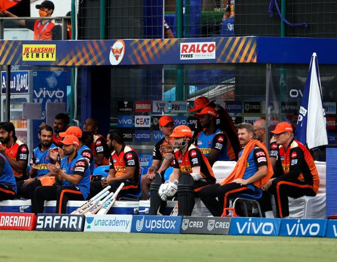 Former skipper David Warner watches from the sidelines as SunRisers Hyderabad go about the motions during the IPL match against Rajasthan Royals in Delhi on Sunday.