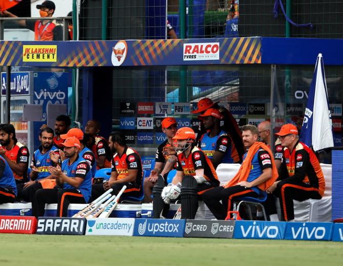 Former skipper David Warner watches from the sidelines as SunRisers Hyderabad go about the motions during the IPL match against Rajasthan Royals in Delhi on Sunday.