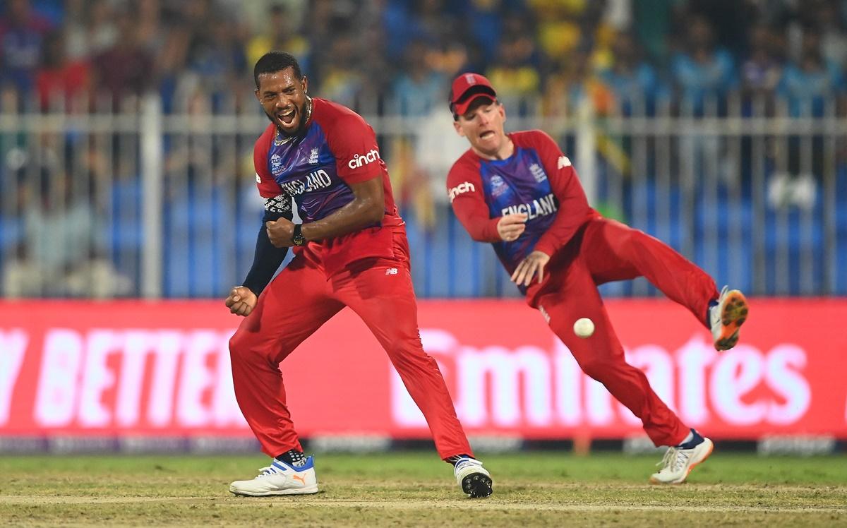 Chris Jordan, left, and Eoin Morgan celebrate the wicket of Avishka Fernando.