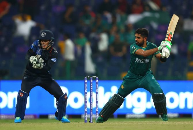 Pakistan opener Babar Azam sends the ball to the boundary during his 49-ball 70.