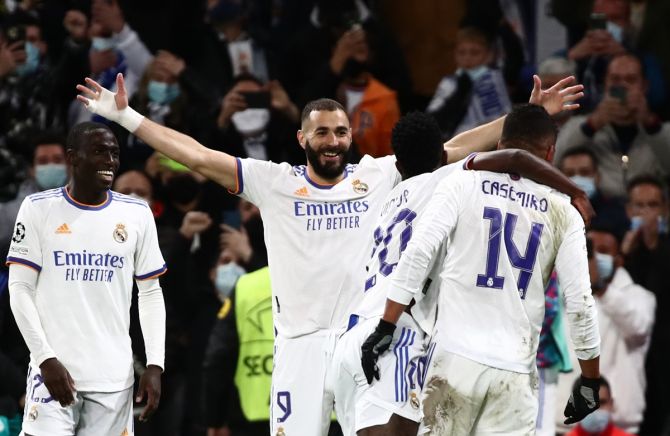 Karim Benzema celebrates scoring Real Madrid's second goal during the Champions League Group D match against Shakhtar Donetsk, at Santiago Bernabeu, Madrid.