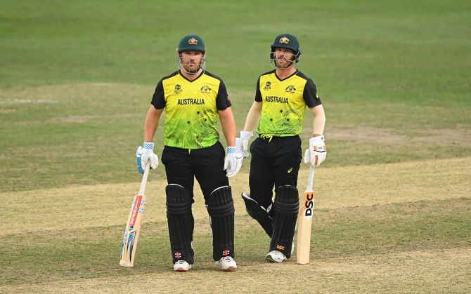 Aaron Finch and David Warner during their opening partnership of 58 runs.