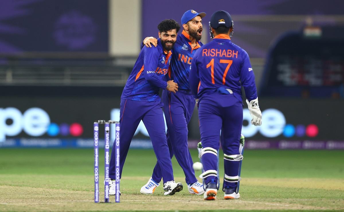 Ravidra Jadeja celebrates with skipper Virat Kohli after dismissing Matthew Cross.