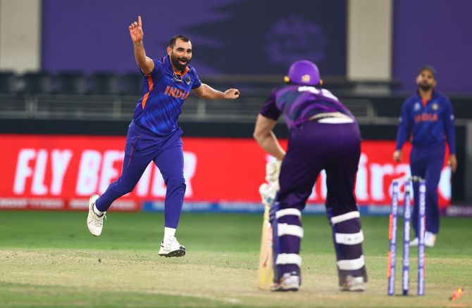 Mohammad Shami celebrates the wicket of Alasdair Evans. Shami and Jadeja fiinished with identical figures of 3 for 15.