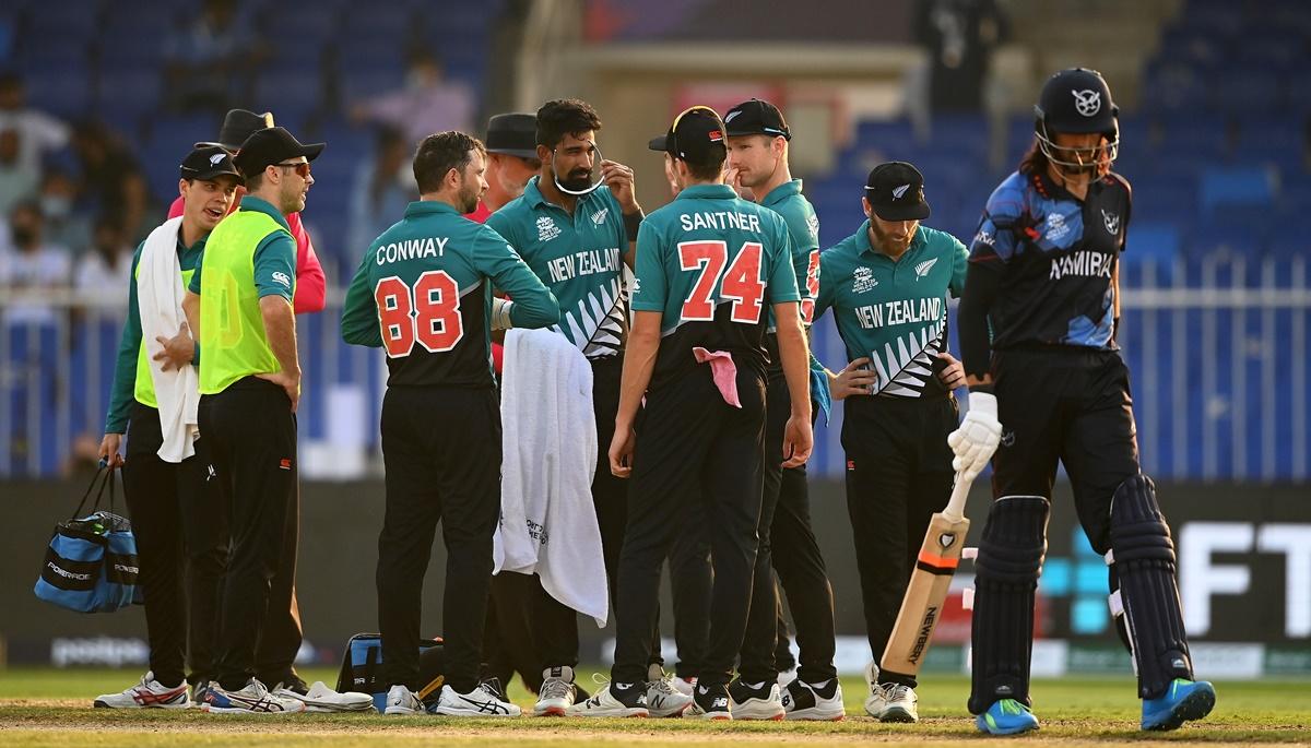 New Zealand spinner Ish Sodhi is checked by medical staff after being hit on the head by a shot from David Wiese.