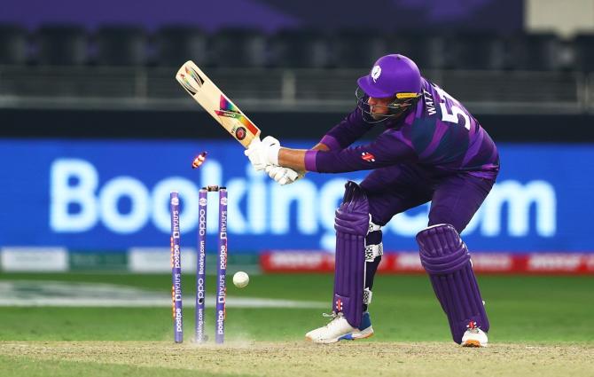 Mark Watt is bowled by Jasprit Bumrah.