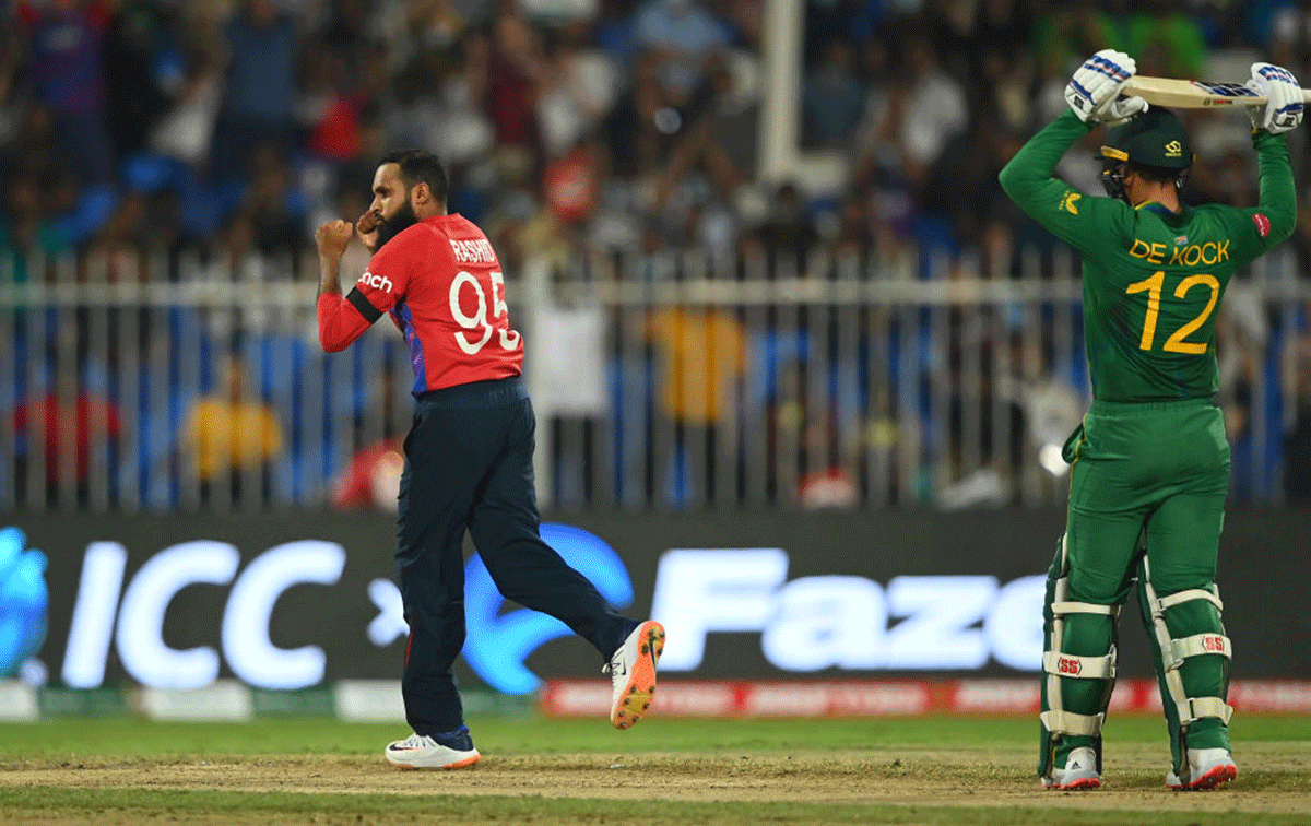 Adil Rashid celebrates the wicket of Quinton De Kock