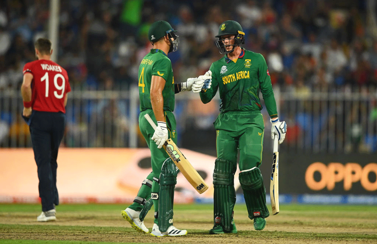 Aiden Markram and Rassie van der Dussen celebrate on completing a 50-run stand