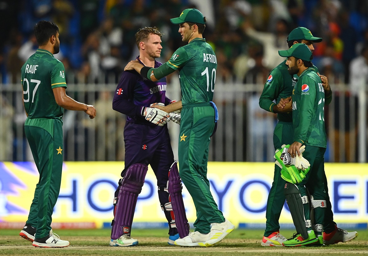 Scotland's Richard Berrington, who scored an unbeaten 54 off 37 balls, is congratulated by Pakistan's Shaheen Afridi at the end of the match.