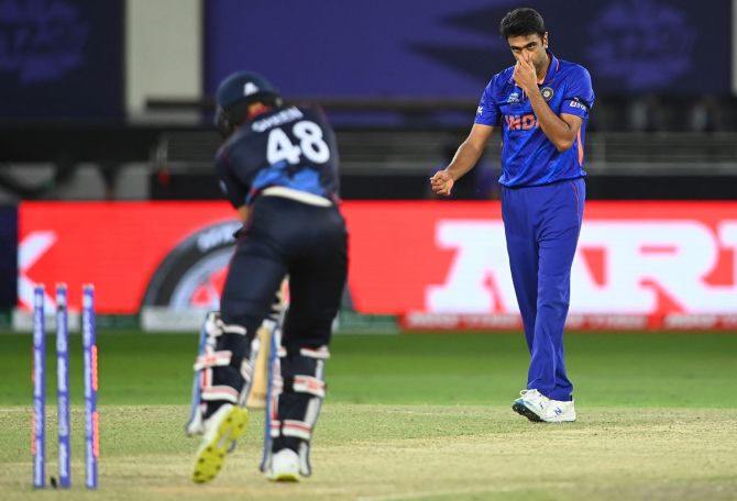 Ravichandran Ashwin reacts after taking the wicket of Zane Green.