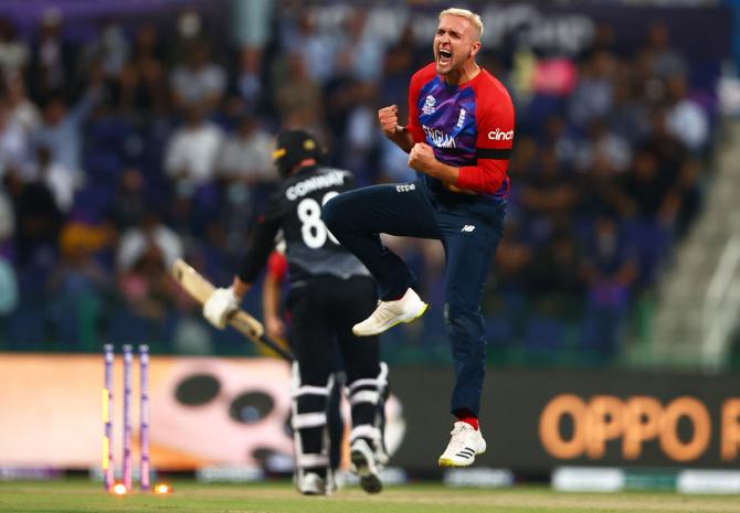 Liam Livingstone celebrates the wicket of Devon Conway.