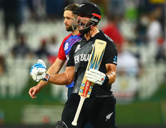 Daryl Mitchell celebrates after New Zealand clinch victory over England in the T20 World Cup semi-final, at Sheikh Zayed stadium in Abu Dhabi, on Wednesday.