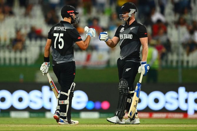  Daryl Mitchell's unbeaten 72 and Jimmy Neesham's blistering cameo led New Zealand to a dramatic five-wicket victory over England in the first Twenty20 World Cup semi-final 