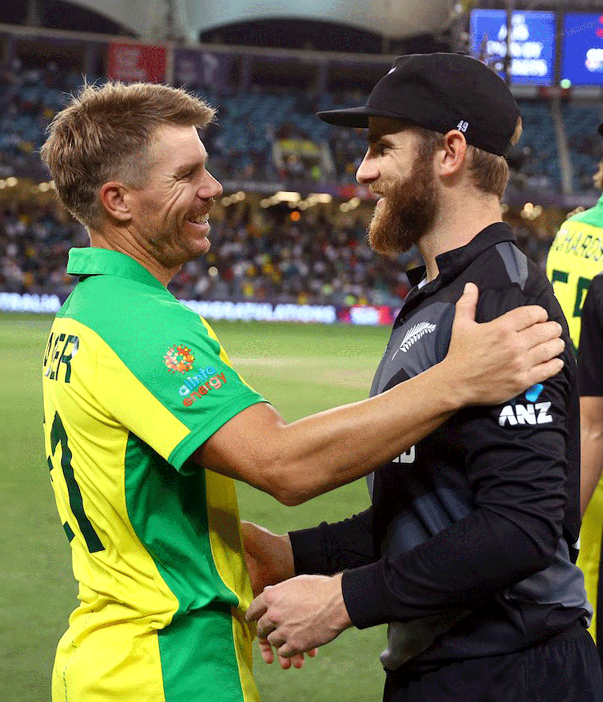 Australia's David Warner and New Zealand's Kane Williamson greet each other after the final on Sunday