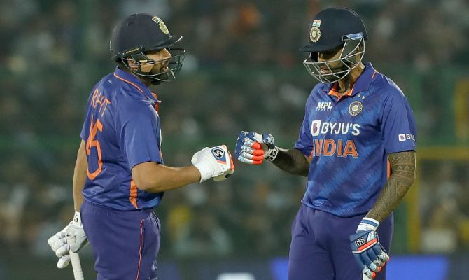 Rohit Sharma and Suryakumar Yadav celebrate a boundary during their 59-run partnership.