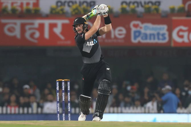 New Zealand opener Martin Guptill dispatches the ball to the boundary.