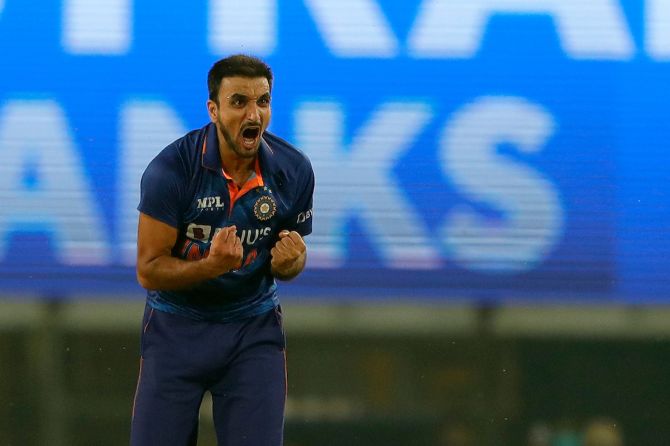 Debutant India pacer Harshal Patel celebrates after dismissing New Zealand's Glenn Phillips.