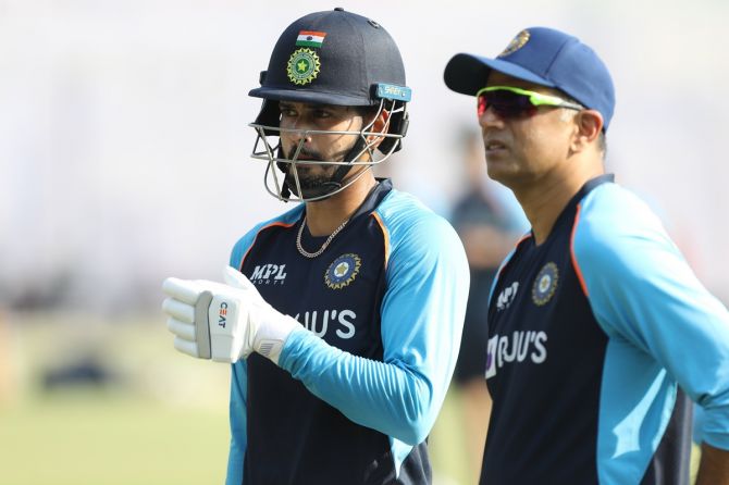 Shreyas Iyer and coach Rahul Dravid during India's practice session on Wednesday, ahead of the first Test against New Zealand, in Kanpur.