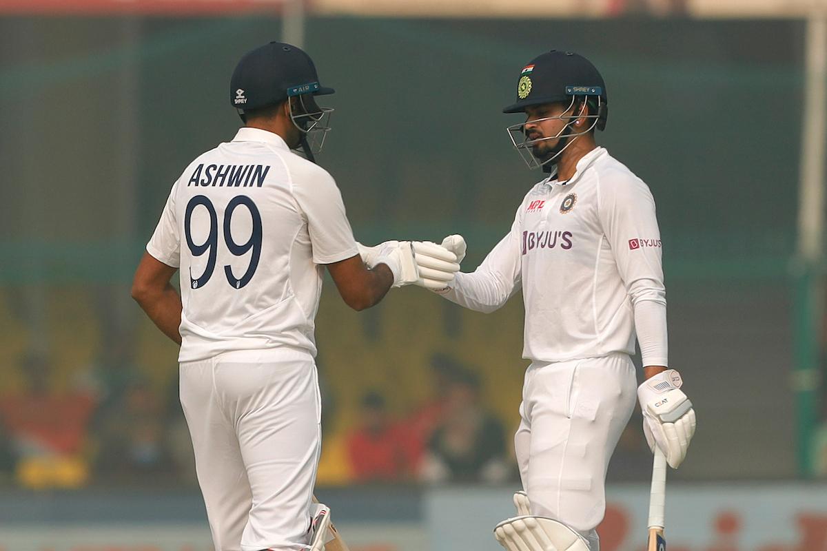 Ravichandran Ashwin and Shreyas Iyer celebrate a boundary during their partnership