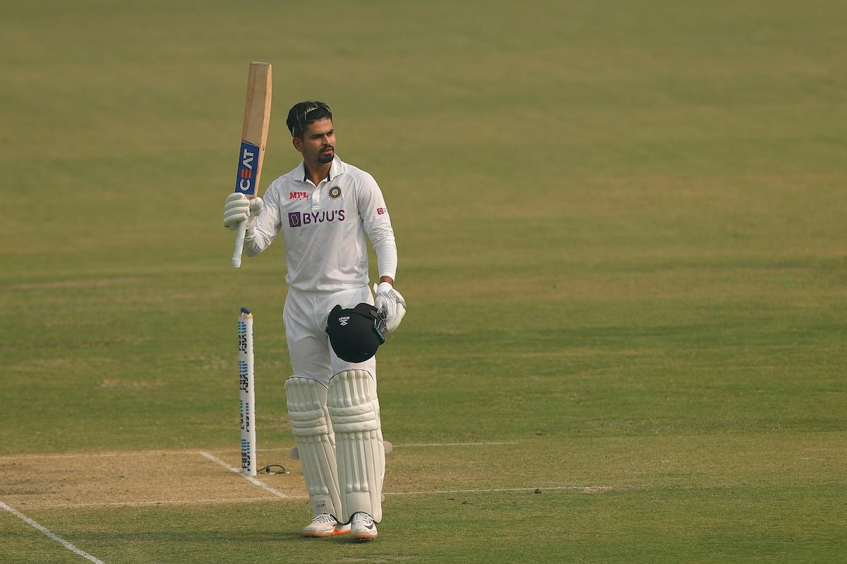 Shreyas Iyer waves to the dressing room after scoring a hundred on debut on Day 2 of the first Test against New Zealand, in Kanpur, on Friday.