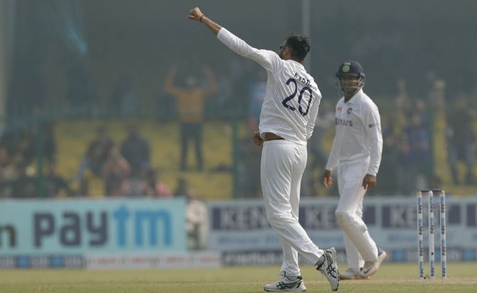 India's Axar Patel celebrates after dismissing New Zealand's Ross Taylor on Day 3 of the first Test, at Green Park in Kanpur, on Saturday.