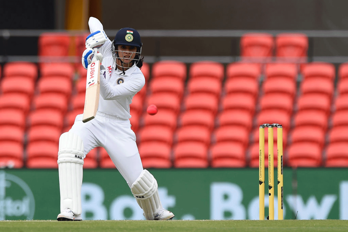 Smriti Mandhana bats en route her century on Day 2 of the pink-ball Test vs Australia in Gold Coast on Friday