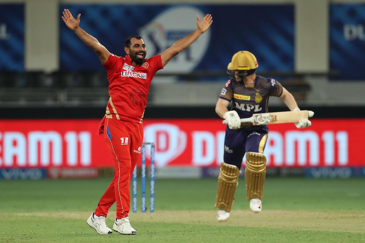 Mohammad Shami celebrates after trapping Eoin Morgan leg before wicket.