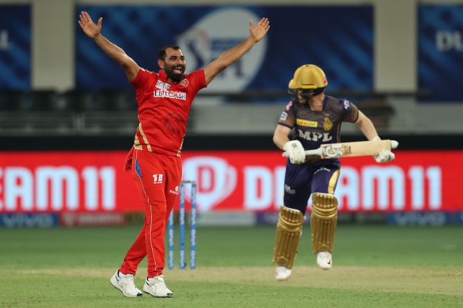 Mohammad Shami celebrates after trapping Eoin Morgan leg before wicket.