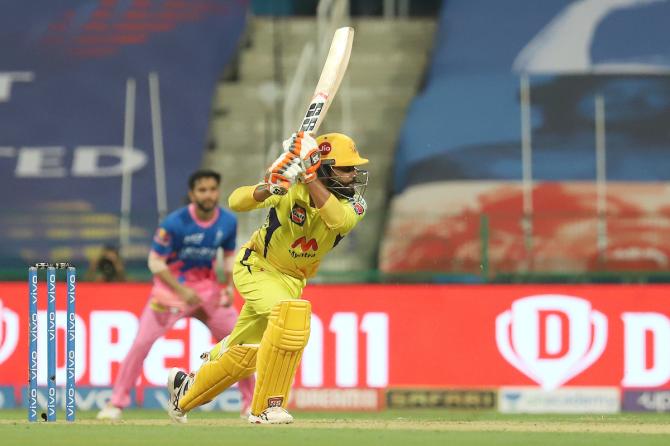 Ravindra Jadeja sends the ball to the boundary. 