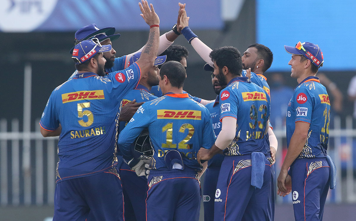 Mumbai Indians players celebrate after Krunal Pandya takes the wicket of Prithvi Shaw.