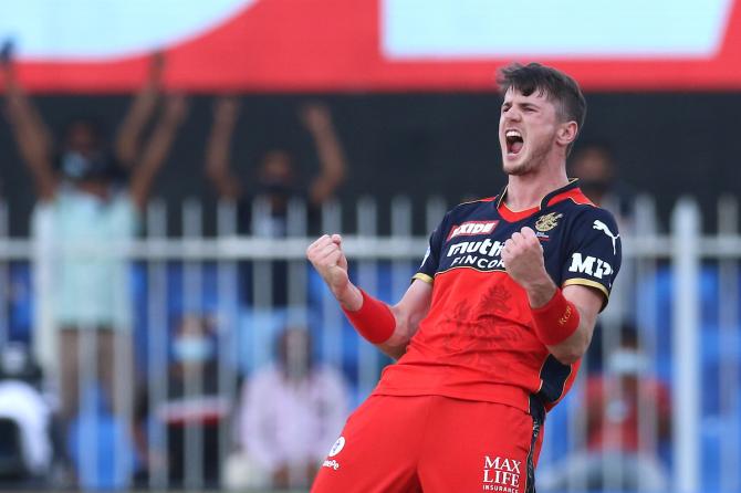 George Garton celebrates the wicket of Aiden Markram.