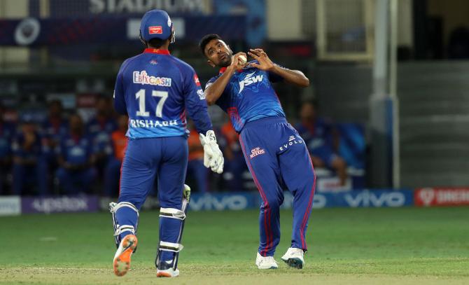 Ravichandran Ashwin takes the catch to dismiss Robin Uthappa off his own bowling.