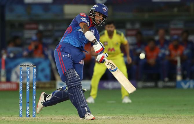 Delhi Capitals opener Shikhar Dhawan hits over the top for six.