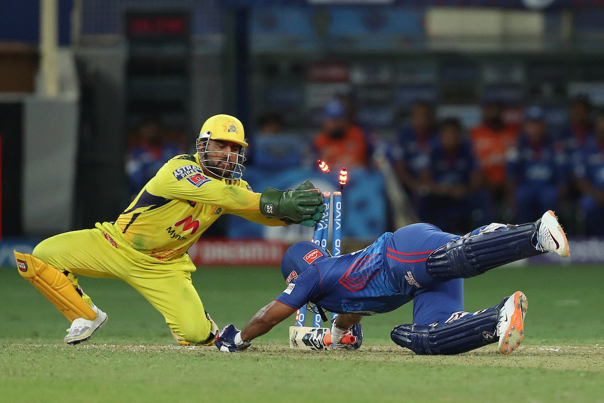 Mahendra Singh Dhoni attempts to stump out Rishabh Pant during their IPL match on Monday