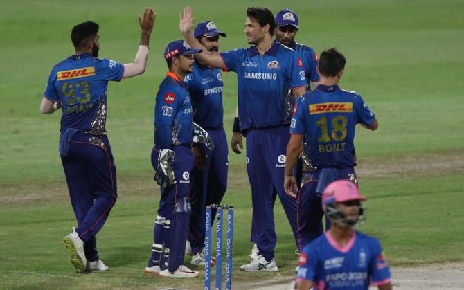 Mumbai Indians pacer Nathan Coulter-Nile celebrates with teammates after dismissing Rajasthan Royals opener Yashasvi Jaiswal.